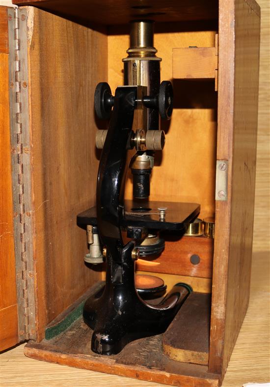 A cased microscope